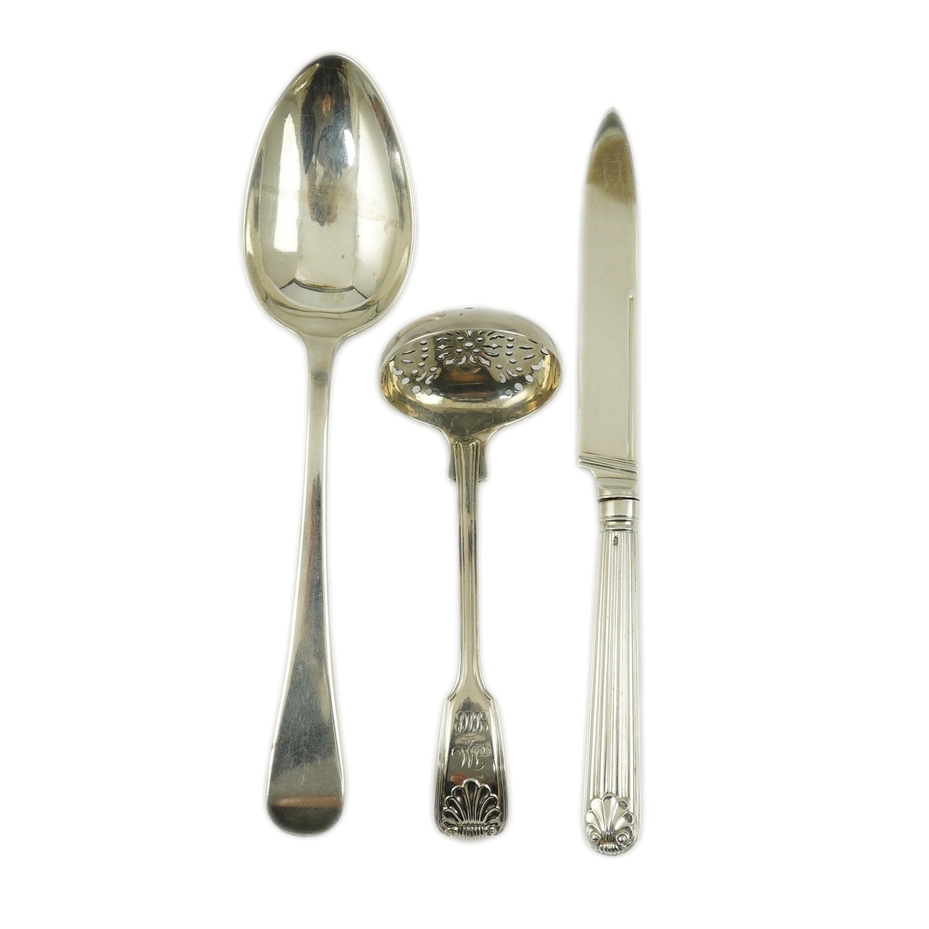 Paul Storr. A George III silver fiddle, thread and shell pattern sifter ladle, London, 1815, 13.9cm, a similar Old English pattern table spoon, London, 1818, 21.2cm, 4oz and a dessert knife, London, 1812.